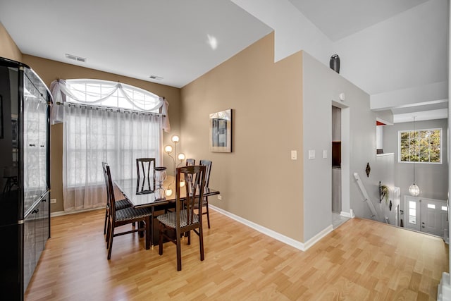 dining area with light wood-type flooring