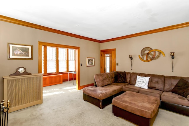 living room with radiator, ornamental molding, and carpet