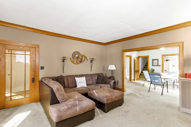 carpeted living room featuring crown molding