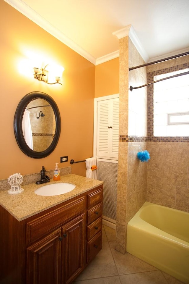 bathroom with tile patterned flooring, vanity, ornamental molding, and shower / bath combination