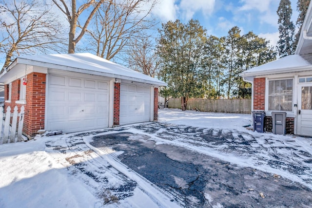 view of snow covered garage