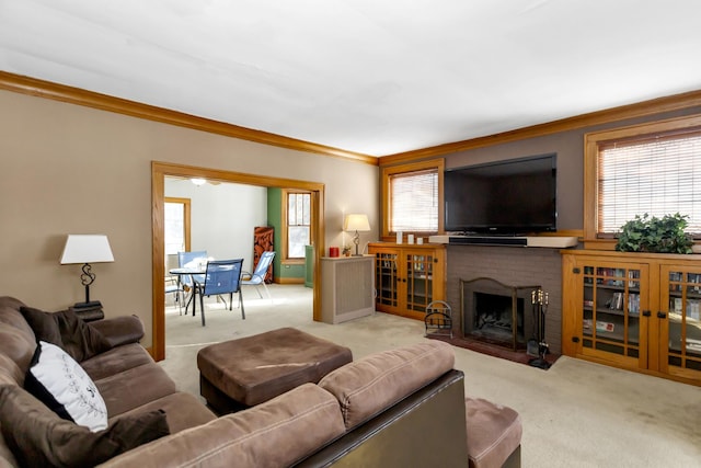 carpeted living room with a brick fireplace and crown molding