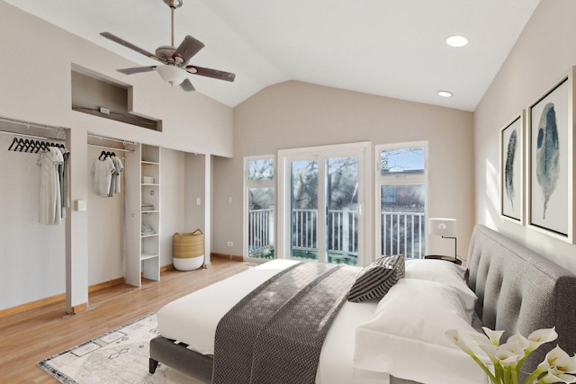 bedroom featuring lofted ceiling, access to exterior, ceiling fan, and light hardwood / wood-style flooring