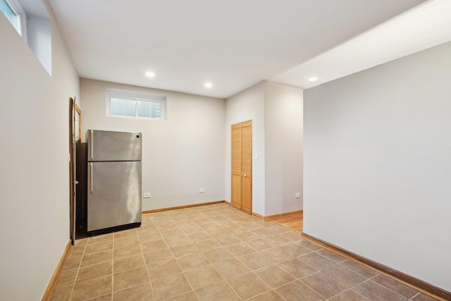 kitchen featuring stainless steel refrigerator