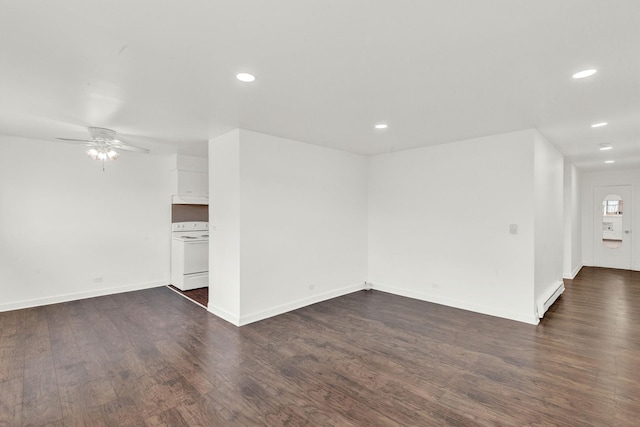 unfurnished living room with ceiling fan, dark hardwood / wood-style floors, and a baseboard radiator