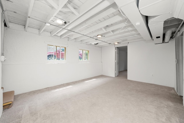 basement with light colored carpet