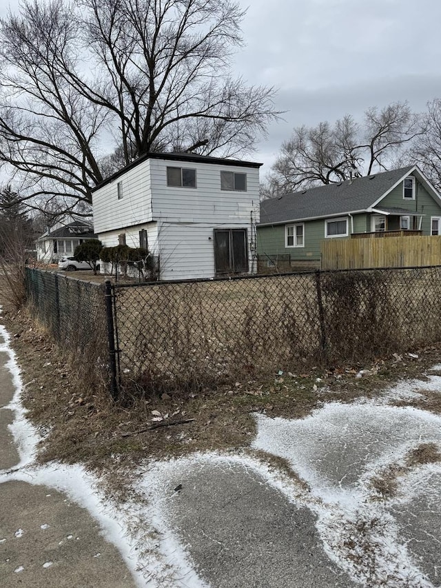 view of snow covered house