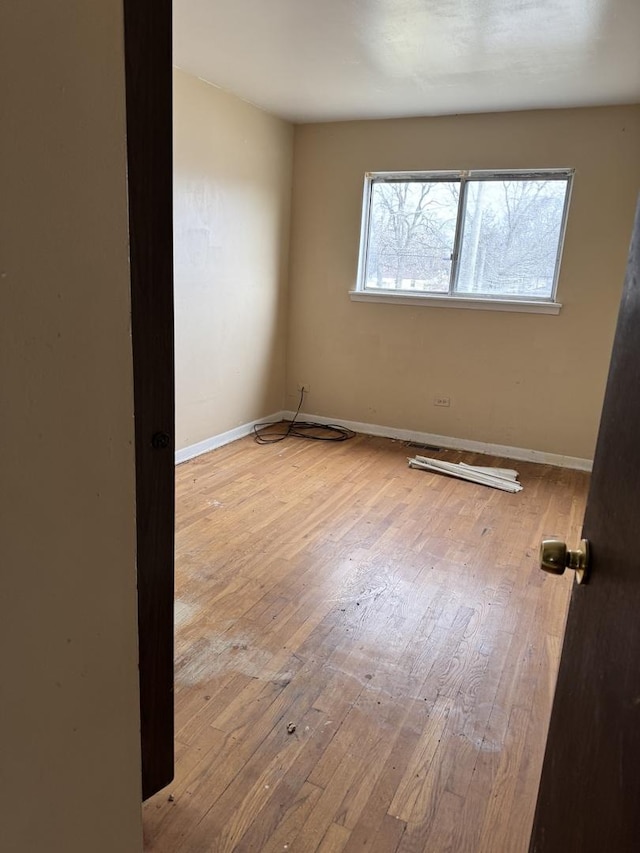 empty room featuring light hardwood / wood-style floors