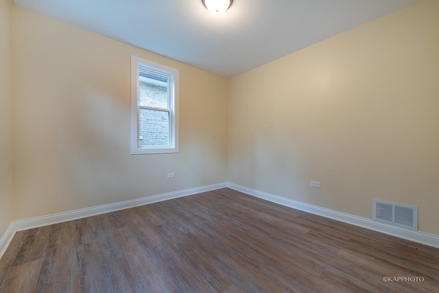 unfurnished room featuring hardwood / wood-style floors