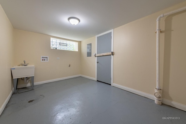 interior space featuring electric panel and hookup for a washing machine