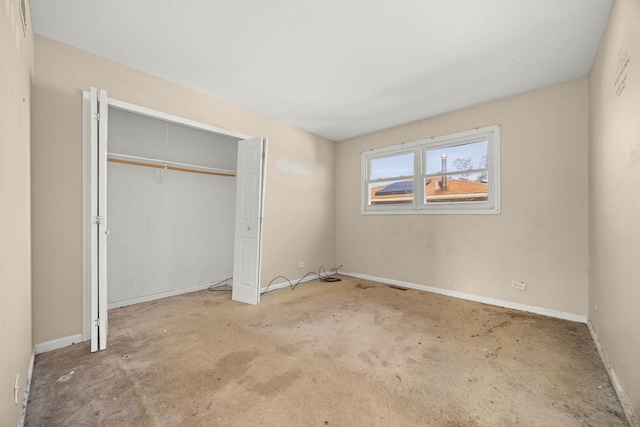 unfurnished bedroom featuring a closet