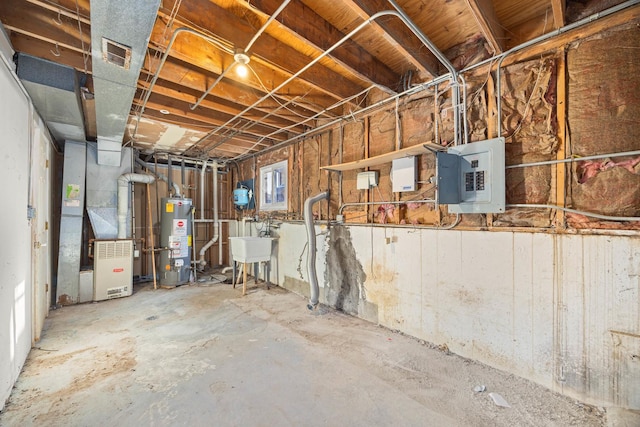 basement with electric panel and water heater