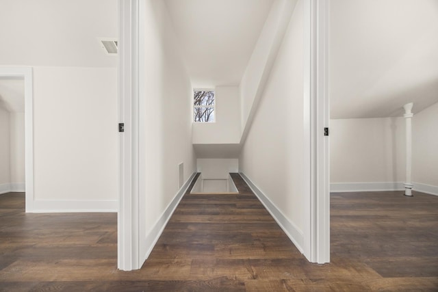 stairs featuring hardwood / wood-style floors