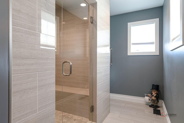 bathroom featuring an enclosed shower