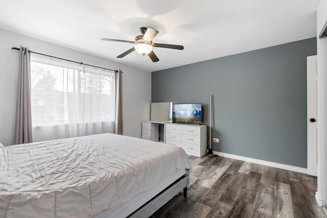 bedroom featuring dark wood-type flooring and ceiling fan