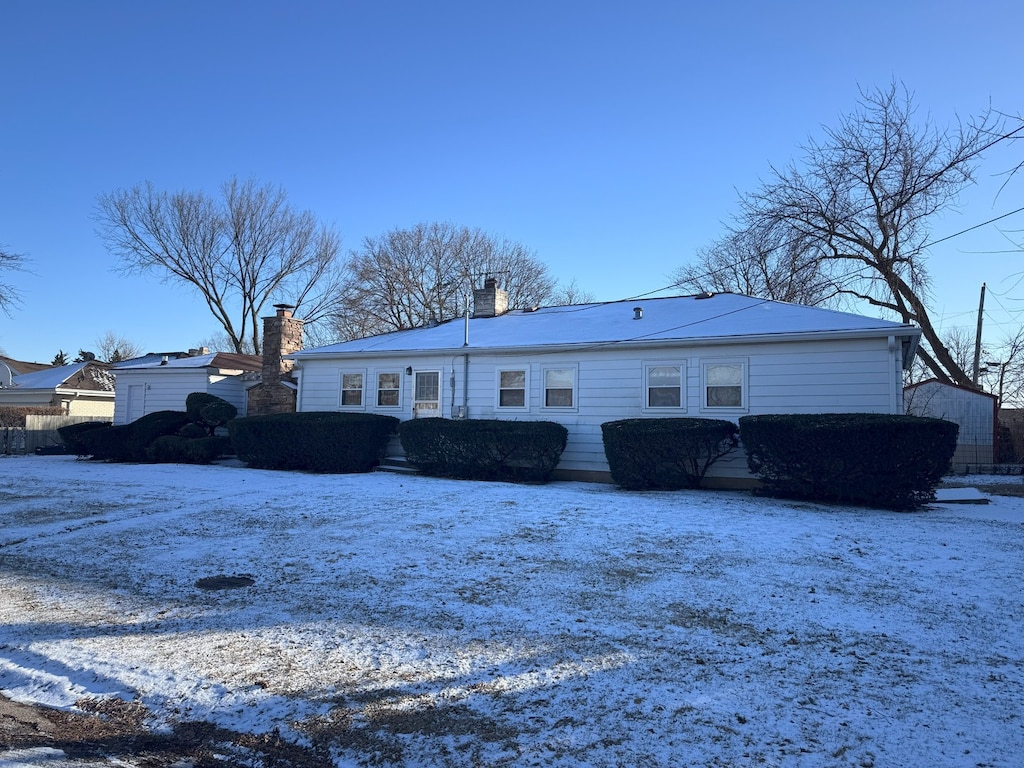 view of snow covered property