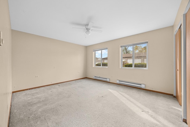 unfurnished bedroom with light carpet, a baseboard radiator, and ceiling fan