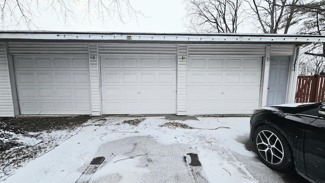 view of snow covered garage