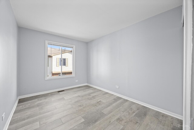 bathroom featuring toilet, an enclosed shower, a textured ceiling, vanity, and tile patterned flooring