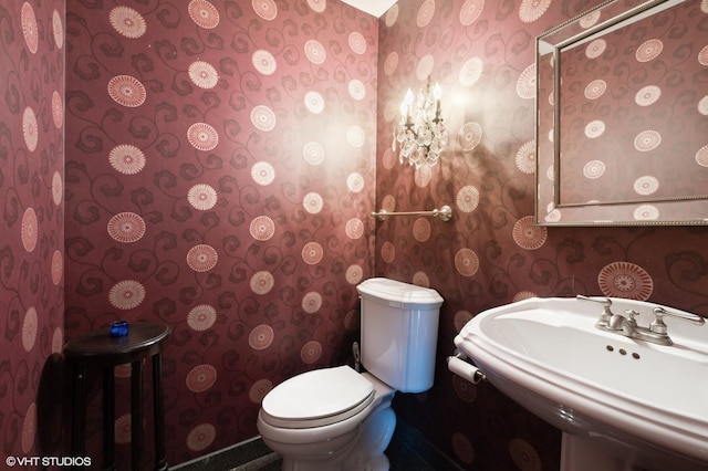 bathroom with sink and toilet