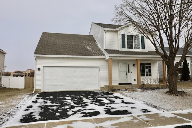 view of front of home with a garage