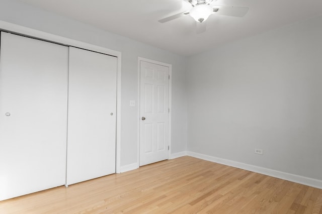 unfurnished bedroom featuring ceiling fan and light hardwood / wood-style floors