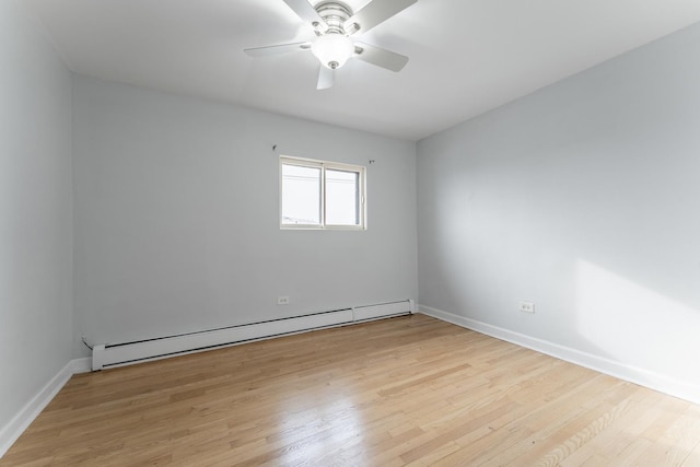 unfurnished room featuring a baseboard radiator, ceiling fan, and light hardwood / wood-style flooring