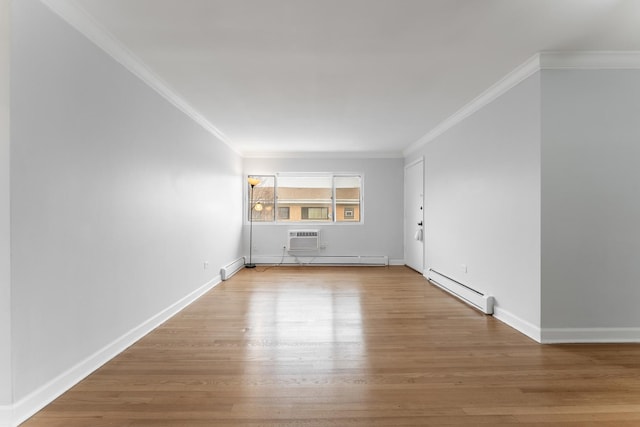 empty room with a wall mounted air conditioner, a baseboard radiator, ornamental molding, and wood-type flooring