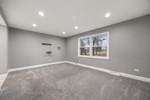 view of carpeted spare room