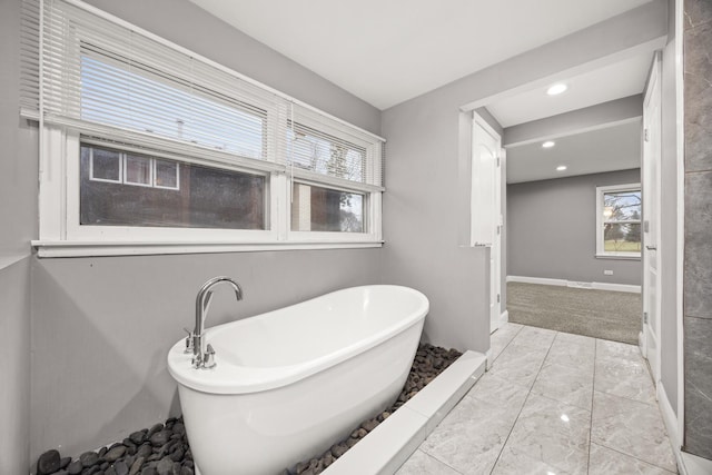 bathroom with a washtub