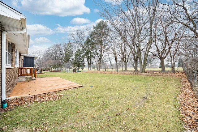 view of yard with a deck