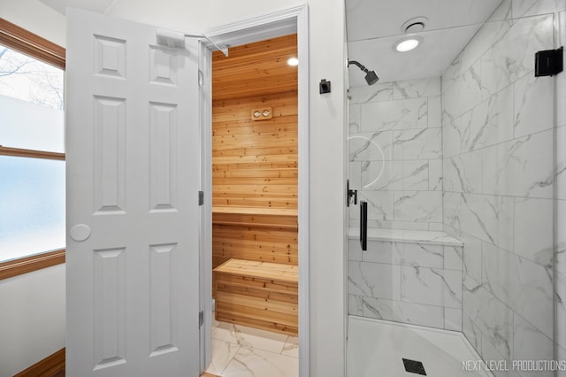 bathroom with a shower with shower door