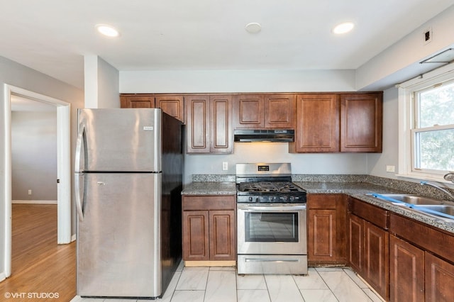 kitchen with sink and appliances with stainless steel finishes