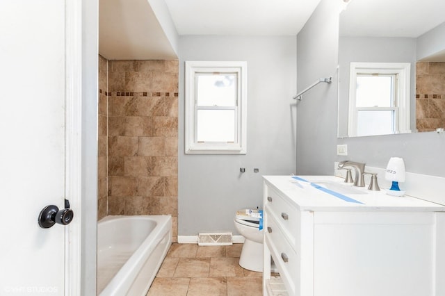 full bathroom featuring vanity, tile patterned flooring, shower / bathtub combination, and toilet