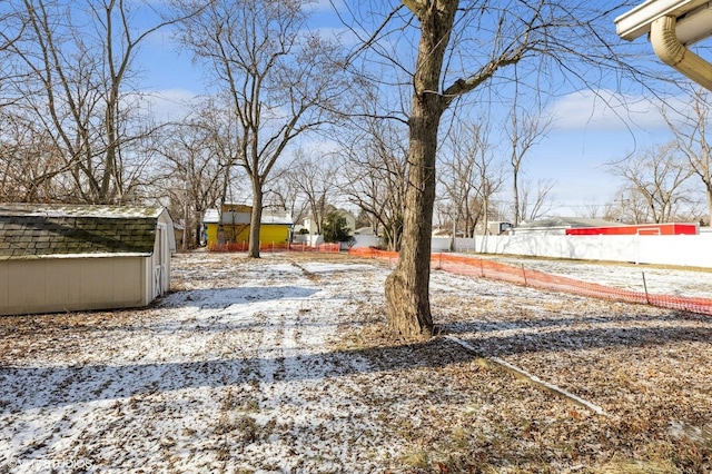 view of yard covered in snow