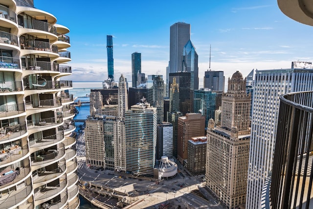 property's view of city featuring a water view