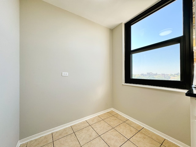 view of tiled spare room