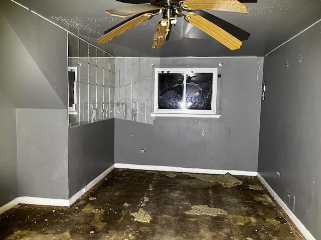 unfurnished room featuring ceiling fan