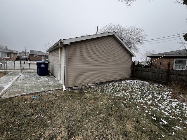 view of side of property with a patio