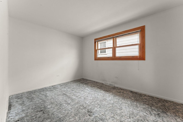 view of carpeted spare room