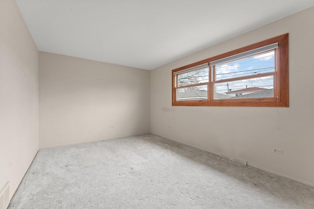 empty room featuring carpet flooring