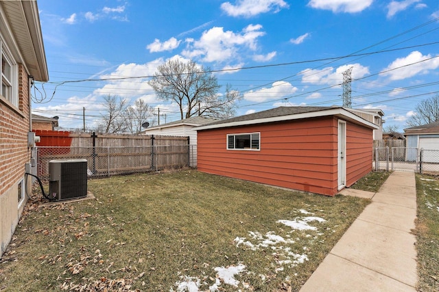 view of yard featuring cooling unit and a storage shed