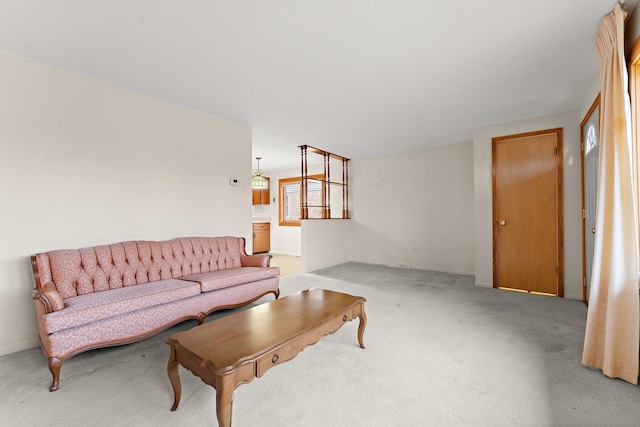 living room featuring light colored carpet