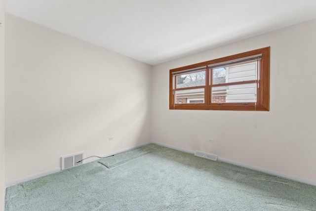 unfurnished room with carpet flooring