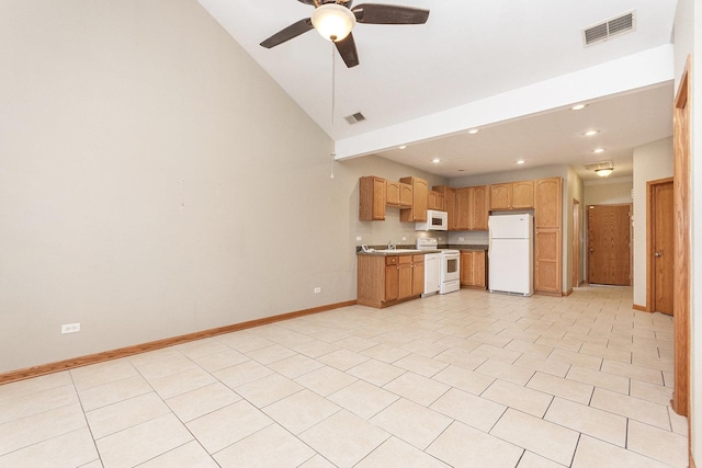 kitchen featuring lofted ceiling, sink, white appliances, light tile patterned floors, and ceiling fan