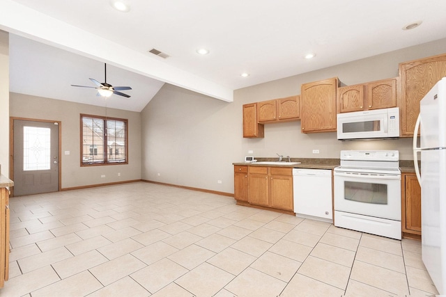 kitchen featuring sink, white appliances, light tile patterned floors, ceiling fan, and vaulted ceiling with beams