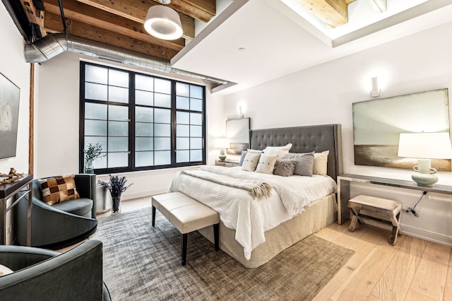 bedroom with light wood-type flooring