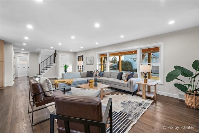 living room featuring dark hardwood / wood-style flooring