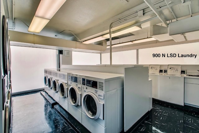 laundry room with washing machine and dryer