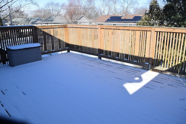 view of snow covered deck